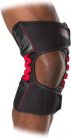 30590 Állítható térdvédő keresztpántokkal