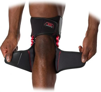 30590 Állítható térdvédő keresztpántokkal